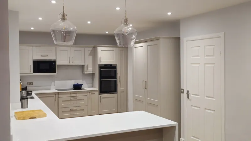 Finished WJS kitchen renovation with pale cabinets and a central island
