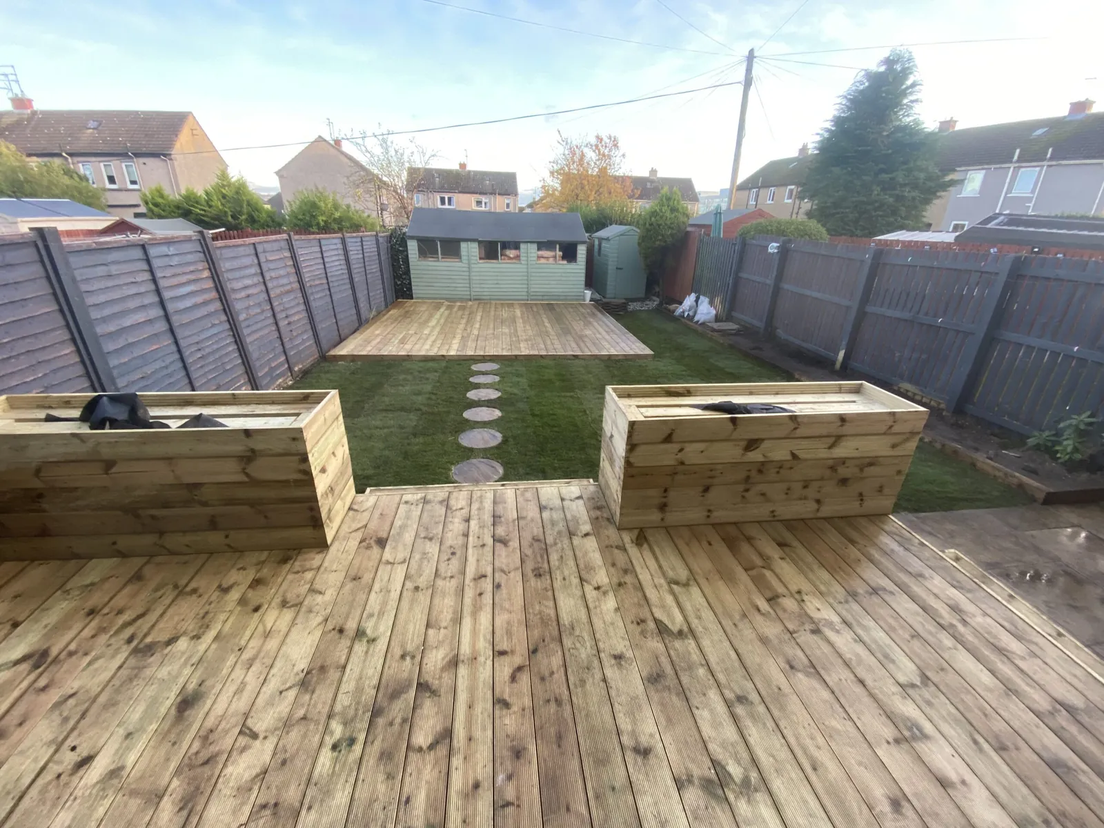 Timber garden deck and raised planters